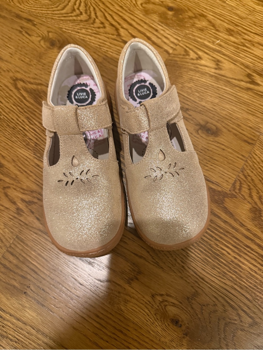 Livie & Luca Girls' Glitter T-Strap Mary Janes in Champagne Gold
